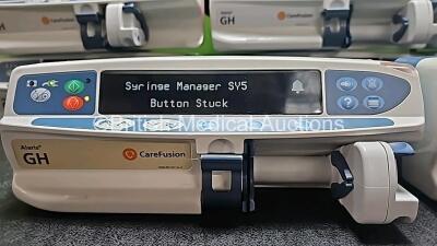 8 x CareFusion Alaris GH Syringe Pumps (7 x Power Up, 1 x No Power and 1 x Missing Battery - See Photos) *SN 135018955 / 800290362 / 800258074 / 800213929 / 800283911 / 800258210 / 800213910 / 800235623* - 3