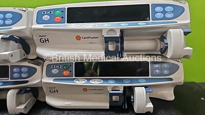 8 x CareFusion Alaris GH Syringe Pumps (7 x Power Up, 1 x No Power and 1 x Missing Battery - See Photos) *SN 135018955 / 800290362 / 800258074 / 800213929 / 800283911 / 800258210 / 800213910 / 800235623* - 7