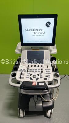 GE Vivid E9 Flat Screen Ultrasound Scanner *S/N VE97072* **Mfd 03/2014** with 1 x Transducer / Probe 4V-D Ref 5160209 *Mfd 01/2011* (Powers Up - HDD REMOVED - 1 x Missing Button - See Pictures)