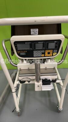 1 x Arjo Maxi-Twin Electric Patient Hoist with Battery and Controller (Powers Up), 1 x Marsden Wheelchair Weighing Scales and 1 x Anetic Aid Accessories Trolley - 3