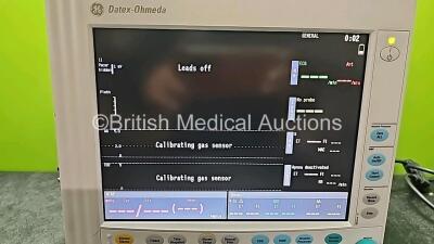 GE Datex Ohmeda Type F-CM1-05 Patient Monitor (Powers Up) 1 x GE E- CAiO-00 Gas Module with D-fend Water Trap and 1 x GE Type E-PRESTN-00 Module with ECG, SpO2, T1, T2, P1, P2 and NIBP Options - 8