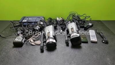 Job Lot Including 2 x Canon DM-XM2 E Camcorders, 1 x Canon MD325 E Camcorder (Damage to Casing) and 1 x HDV DN-300 Data Video Recorder