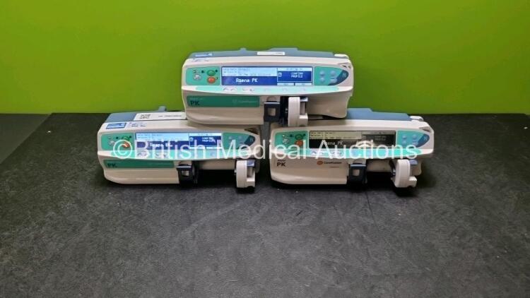 Job Lot of Carefusion Syringe Pumps Including 2 x Alaris Plus PK and 1 x Alaris PK (All Powers Up) *SN 520002431 / 520002429 / 800502285*