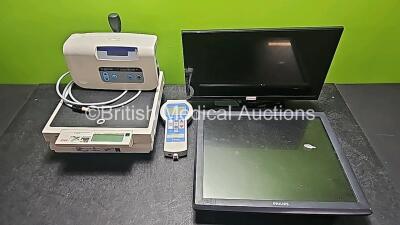 Mixed Lot Including 2 x Seca Scales, 1 x Inditherm Medical Cosytherm Unit, 1 x Delfi Portable Tourniquet System, 1 x Logik HD LCD TV and 1 x Philips LCD Touch Monitor *SN 11/7626 / 2006-1265 / B14C011388* - 2