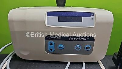 Mixed Lot Including 2 x Seca Scales, 1 x Inditherm Medical Cosytherm Unit, 1 x Delfi Portable Tourniquet System, 1 x Logik HD LCD TV and 1 x Philips LCD Touch Monitor *SN 11/7626 / 2006-1265 / B14C011388* - 3