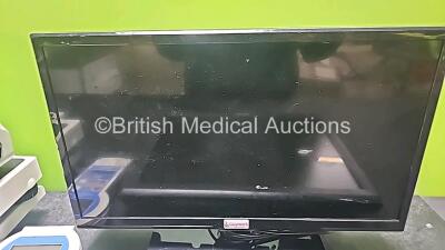 Mixed Lot Including 2 x Seca Scales, 1 x Inditherm Medical Cosytherm Unit, 1 x Delfi Portable Tourniquet System, 1 x Logik HD LCD TV and 1 x Philips LCD Touch Monitor *SN 11/7626 / 2006-1265 / B14C011388* - 5