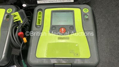 2 x Zoll AED PRO Defibrillators (Both Power Up) with 2 x 3 Lead ECG Leads, 2 x Batteries and 2 x Electrode Packs (Both In Date) in Carry Cases - 3