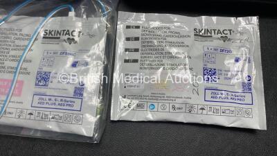 2 x Zoll AED PRO Defibrillators (Both Power Up) with 2 x 3 Lead ECG Leads, 2 x Batteries and 2 x Electrode Packs (Both In Date) in Carry Cases - 4