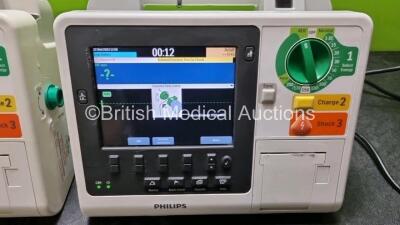 2 x Philips Heartstart XL+ Defibrillators (Both Power Up) Including Pacer, ECG and Printer Options with 1 x Battery - 3