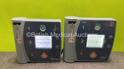 Job Lot Including 1 x Philips Heartstart FR2+ Defibrillator and 1 x Laerdal Heartstart FR2 Defibrillator with 2 x Batteries (Both Power Up with Low Battery)