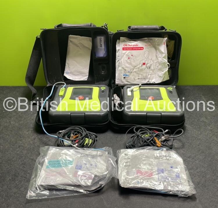 2 x Zoll AED PRO Defibrillators (Both Power Up) with 2 x 3 Lead ECG Leads, 2 x Batteries and 3 x Electrode Packs (1 In Date, 2 Expired) in Carry Cases