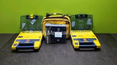 Job Lot Including 1 x Laerdal Heartstart FR2+ Defibrillator (Powers Up with Stock Battery Stock Battery Not Not Included) 1 x Cardiac Science Powerheart AED G3 Automated External Defibrillator (Powers Up) and 1 x Cardiac Science AED Trainer