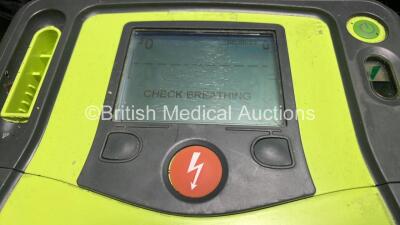 2 x Zoll AED PRO Defibrillators (Both Power Up with Damage to Screen - See Photos) with 2 x 3 Lead ECG Leads, 2 x Batteries and 2 x Electrode Packs (Both In Date) in Carry Cases - 3