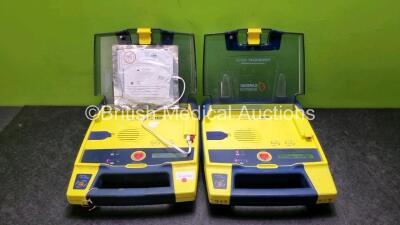 2 x Cardiac Science Powerheart AED G3 Automated External Defibrillators (Both Power Up)