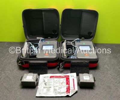 2 x Philips Heartstart FR3 Defibrillators (Both Power Up) In Carry Cases with 1 x Electrode Pack (In Date) and 4 x Batteries (Install Before 2028 / 2027 / 2027 / 2027)