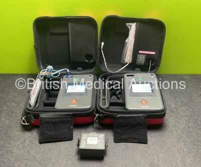 2 x Philips Heartstart FR3 Defibrillators (Both Power Up) In Carry Cases with 3 x Batteries (Install Before 2028 / 2025 / 2025)