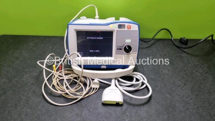 Zoll R Series Plus Defibrillator / Monitor (Powers Up) Including Pacer, ECG and Printer Options with 3 Lead ECG Lead and Paddle Lead