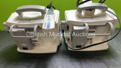 2 x Philips Heartstart MRx Defibrillators / Monitors Including ECG, and Printer Options (Both Power Up) with 2 x Philips M3725A Test Loads, 2 x Paddle Leads and 2 x Philips M3539A Modules - 7