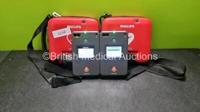 2 x Philips Heartstart FR3 Defibrillators (Both Power Up with Stock Battery Stock Battery Not Included) In Carry Cases *SN C17A00189 / C16L00878*