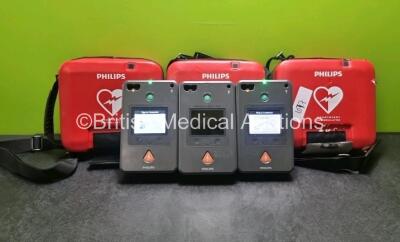 3 x Philips Heartstart FR3 Defibrillators (Both Power Up with Stock Battery Stock Battery Not Included) In Carry Cases *SN C16L00660 / C18B00022 / C14B00240*