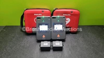 2 x Philips Heartstart FR3 Defibrillators (Both Power Up) In Carry Cases with 3 x Batteries *Install Before 2022 / 2024 / 2026*