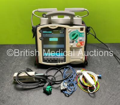 Philips Heartstart MRx Defibrillator with External Hard Paddles (Powers Up) Including Pacer, SpO2, NBP, ECG and Printer Options with Philips M3539A Module, Philips M3538A Battery, Philips M3725A Test Load, 3 Lead ECG Lead, Paddle Lead and SpO2 Sensor