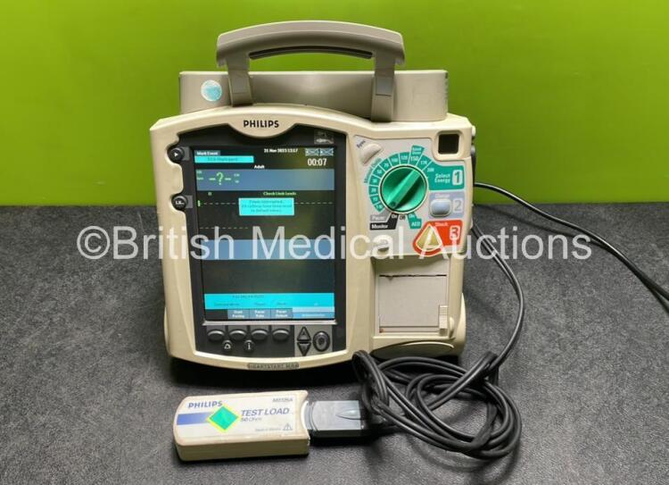 Philips Heartstart MRx Defibrillator with External Hard Paddle Dock (Powers Up) Including Pacer, ECG and Printer Options with Philips M3539A Module, Philips M3538A Battery, Philips M3725A Test Load and Paddle Lead