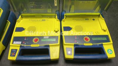 4 x Cardiac Science Powerheart AED G3 Automated External Defibrillators with 4 x Batteries and 1 x Electrode Pack (Expired) in Carry Cases (All Power Up) - 4