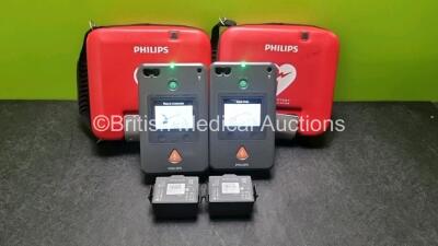 2 x Philips Heartstart FR3 Defibrillators (Both Power Up) In Carry Cases with 4 x Batteries *Install Before 2027 / 2022 / 2026*