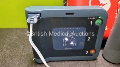 Job Lot Including 1 x Philips Heartstart FRx Defibrillator (Powers Up) In Carry Case with 2 x M5070A Batteries *Exp 2019 / 2024* 1 x Heartstart Smart Pads *Exp 2024* and 1 x Philips Heartstart FR2+ Defibrillator (Powers Up) with 1 x Battery - 3