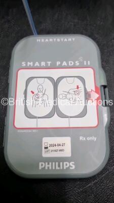 Job Lot Including 1 x Philips Heartstart FRx Defibrillator (Powers Up) In Carry Case with 2 x M5070A Batteries *Exp 2019 / 2024* 1 x Heartstart Smart Pads *Exp 2024* and 1 x Philips Heartstart FR2+ Defibrillator (Powers Up) with 1 x Battery - 4