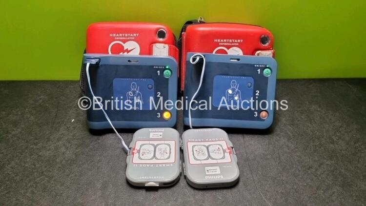 2 x Philips Heartstart FRx Defibrillators (Both Power Up) In Carry Case with 2 x M5070A Batteries *Exp 2026 / 2027* and 2 x Heartstart Smart Pads *Exp 2024 2023*