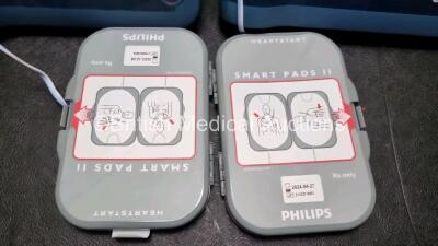 2 x Philips Heartstart FRx Defibrillators (Both Power Up) In Carry Case with 2 x M5070A Batteries *Exp 2026 / 2027* and 2 x Heartstart Smart Pads *Exp 2024 2023* - 4