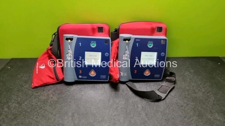 2 x Philips Heartstart FR2+ Defibrillators (Both Power Up) In 2 x Carry Case with 2 x Batteries *Install Before 2025 / 2023* and 2 x Philips Fast Response Kit