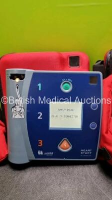 2 x Philips Heartstart FR2+ Defibrillators (Both Power Up) In 2 x Carry Case with 2 x Batteries *Install Before 2025 / 2023* and 2 x Philips Fast Response Kit - 2