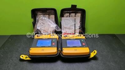 2 x Medtronic Physio Control Lifepak 1000 Defibrillators *Mfd 2013* (Both Power Up 1 x with Crack in Casing - See Photo) *SN 41245150 / 41245149*