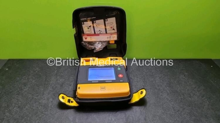 Medtronic Physio Control Lifepak 1000 Defibrillator *Mfd 2013* (Powers Up) *SN 41245153*