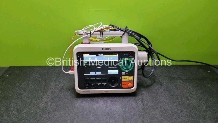 Philips Efficia DFM100 Defibrillator *Mfd - 2018* (Powers Up) Including ECG and Printer Options with 1 x Paddle Lead and 1 x 3 Lead ECG Lead