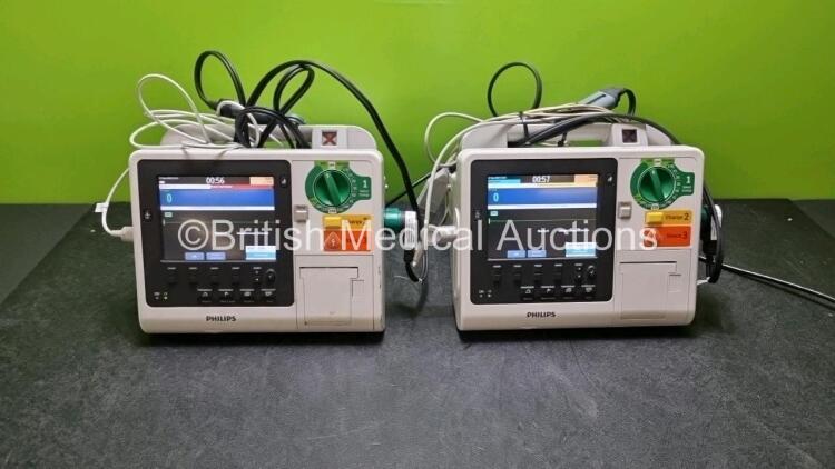 2 x Philips Heartstart XL+ Defibrillators (Both Power Up) Including Pacer, ECG and Printer Options with 2 x Paddle Lead, 2 x 3 Lead ECG Leads and 2 x Batteries