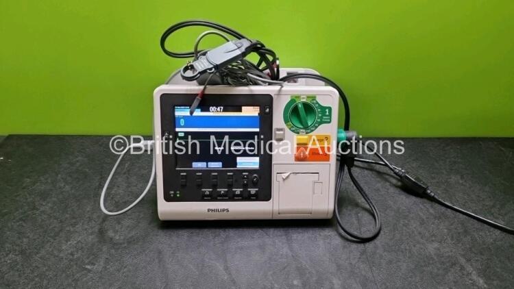 Philips Heartstart XL+ Defibrillator (Powers Up) Including Pacer, ECG, SpO2, CO2, NIBP and Printer Options with, 1 x Battery, 1 x Paddle Lead and 1 x 3 Lead ECG Lead