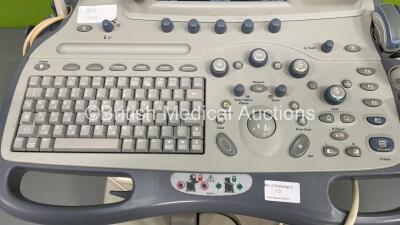 GE Logiq 9 Ultrasound Scanner Model 5177000-2 *S/N 93474US5* **Mfd 04/2008** Software Version R7.0.5 with 5 x Transducers / Probes ( i12L Ref 2264882 *Mfd 01/2008* / M12L Ref 2294512 *Mfd 12/2006* Cable Damaged - See Photo / 4C Ref 24013659 *Mfd 04/2011* - 2