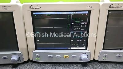 3 x Mindray Datascope Trio Patient Monitors Including ECG, SpO2, T1 and NIBP Options (2 x Power Up, 1 x Powers Up with Blank Screen, 1 x Damaged Handle and 1 x Damaged Button - See Photos) - 4