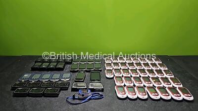 Large Quantity of Various Insulin Pumps and Blood Glucose Monitors (Some Damaged - Some Missing Battery Covers - See Photos) *GH*