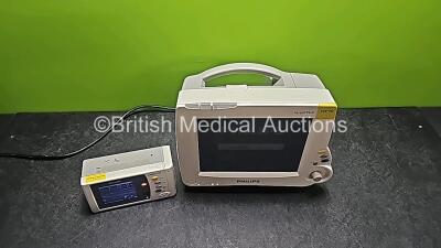 Philips IntelliVue MP30 Patient Monitor (Powers Up and Cracked Casing - See Photos) with 1 x Philips IntelliVue X2 Handheld Patient Monitor Including ECG, SpO2, NBP, Temp and Press Options (Powers Up, Damaged Buttons and Damaged Casing -See Photos) - 2