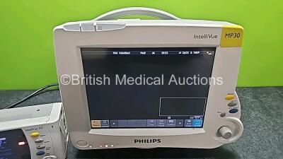 Philips IntelliVue MP30 Patient Monitor (Powers Up and Cracked Casing - See Photos) with 1 x Philips IntelliVue X2 Handheld Patient Monitor Including ECG, SpO2, NBP, Temp and Press Options (Powers Up, Damaged Buttons and Damaged Casing -See Photos) - 5