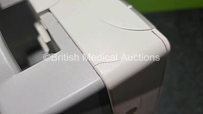 Philips IntelliVue MP30 Patient Monitor (Powers Up and Cracked Casing - See Photos) with 1 x Philips IntelliVue X2 Handheld Patient Monitor Including ECG, SpO2, NBP, Temp and Press Options (Powers Up, Damaged Buttons and Damaged Casing -See Photos) - 10