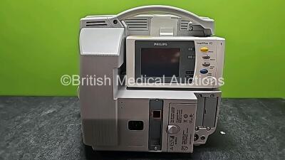 Philips IntelliVue MP30 Patient Monitor (Powers Up and Cracked Casing - See Photos) with 1 x Philips IntelliVue X2 Handheld Patient Monitor Including ECG, SpO2, NBP, Temp and Press Options (Powers Up, Damaged Buttons and Damaged Casing -See Photos) - 12