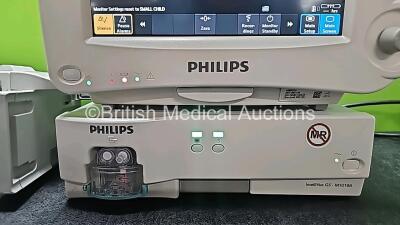 Job Lot Including 1 x Philips IntelliVue MP30 Anesthesia Patient Monitor (Powers Up and 1 x Missing Battery - See Photo) with 1 x Philips IntelliVue X2 Handheld Patient Monitor Including ECG, SpO2, NBP, Temp and Press Options (Powers Up and Damaged Casing - 4