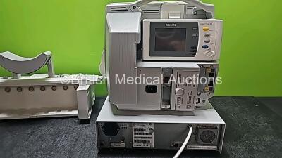 Job Lot Including 1 x Philips IntelliVue MP30 Anesthesia Patient Monitor (Powers Up and 1 x Missing Battery - See Photo) with 1 x Philips IntelliVue X2 Handheld Patient Monitor Including ECG, SpO2, NBP, Temp and Press Options (Powers Up and Damaged Casing - 11