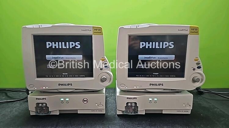 Job Lot Including 2 x Philips IntelliVue MP30 Anesthesia Patient Monitors (Both Power Up and 1 x Missing Battery) and 2 x Philips IntelliVue G5 M1019A Gas Modules with 2 x Water Traps (Both Power Up)